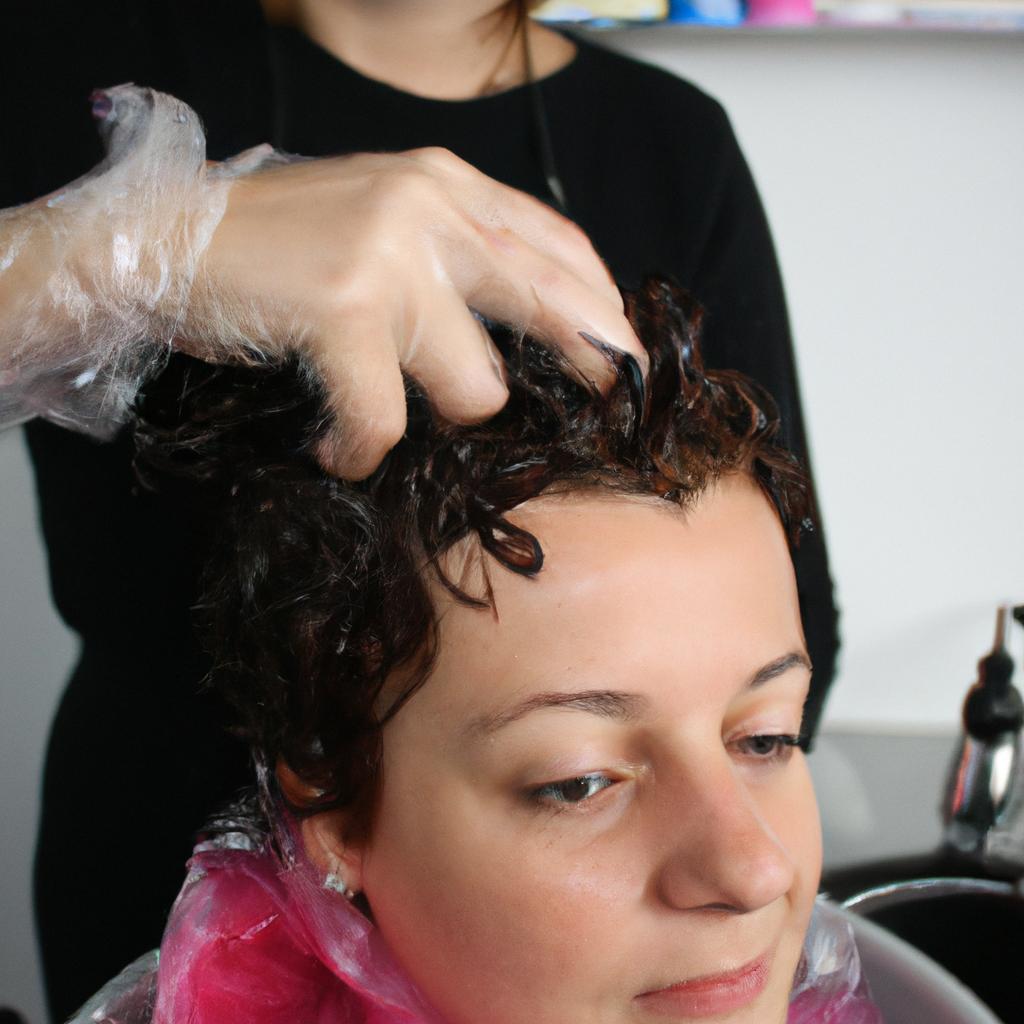 Woman applying perm solution, hairdresser